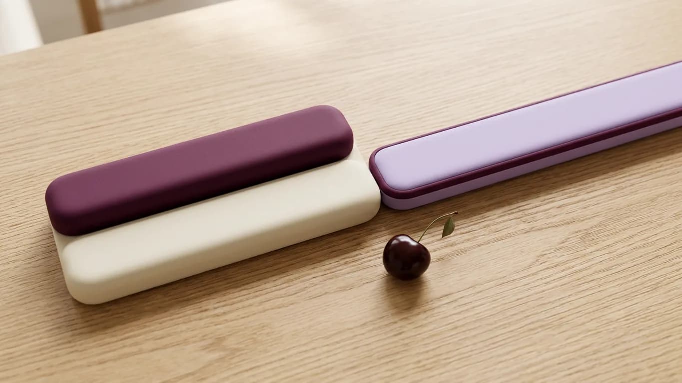 Three horizontal bars on light oak: a long cream bar and a shorter plum bar stacked directly on top of each other on the left, then a soft lavender bar continuing to the right from where the pair ends, with a single dark cherry at the seam between them