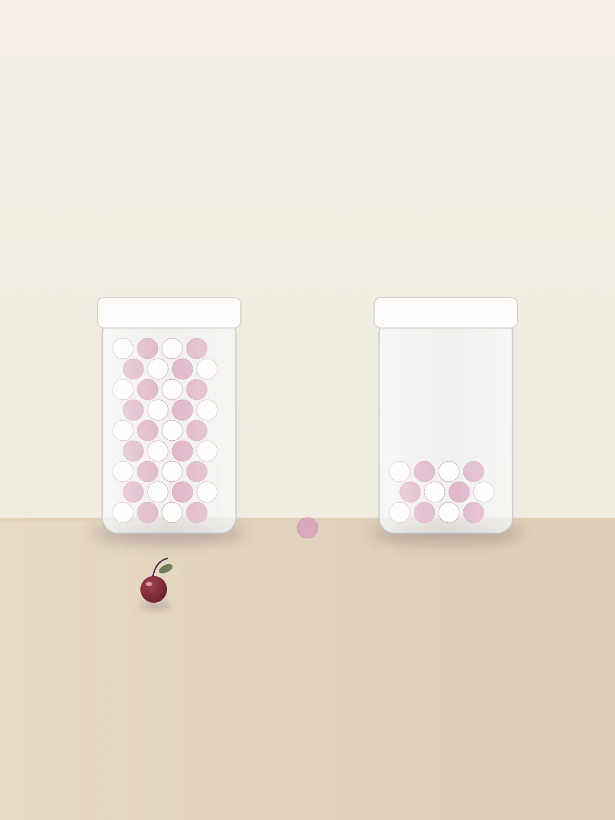 Two glass jars side by side on a pale shelf, one nearly full of small pink and cream tokens and the other almost empty, with a single token resting between them